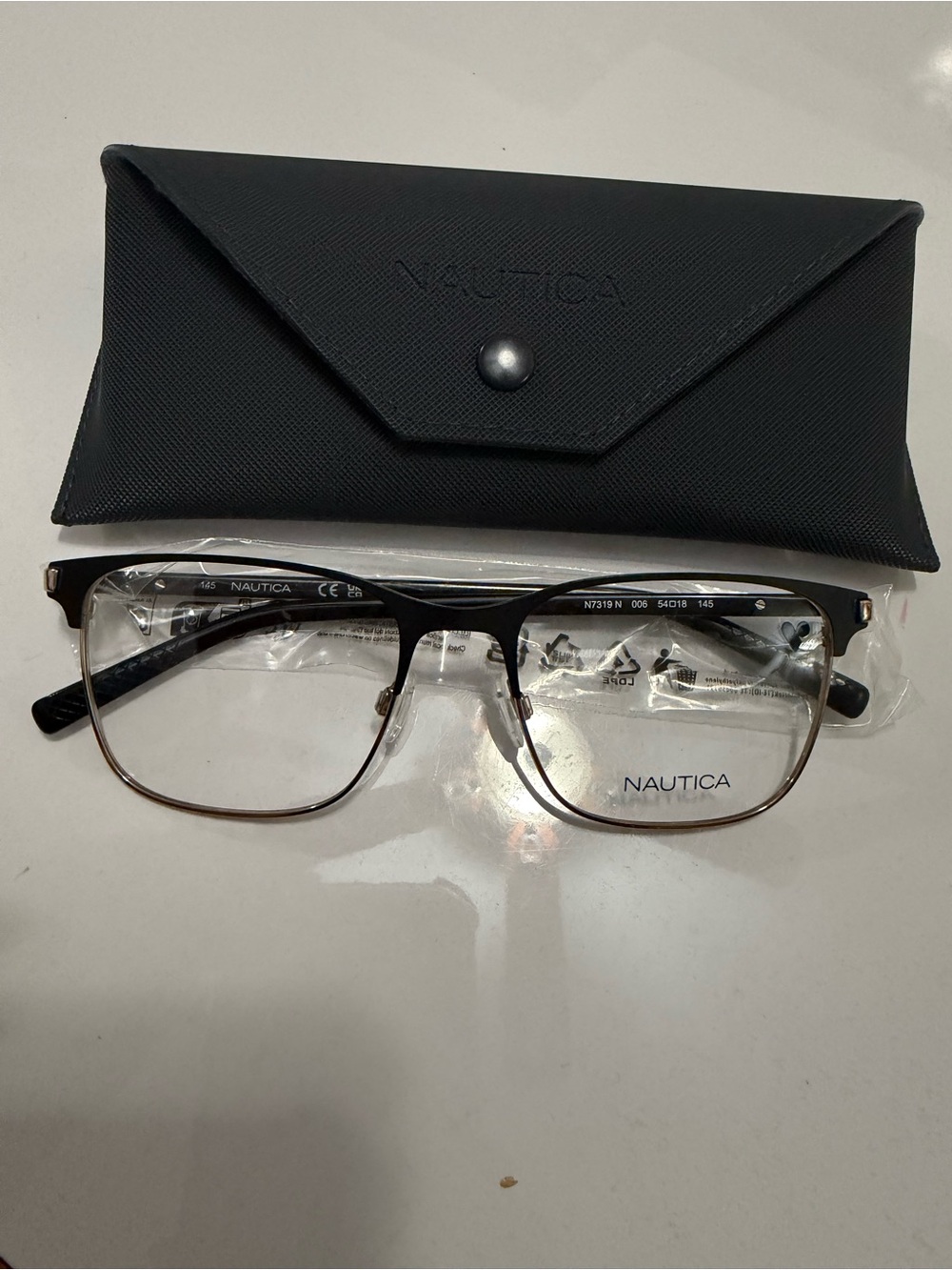 Nautica Men’s Black and Gold Eyeglasses with Logo Case